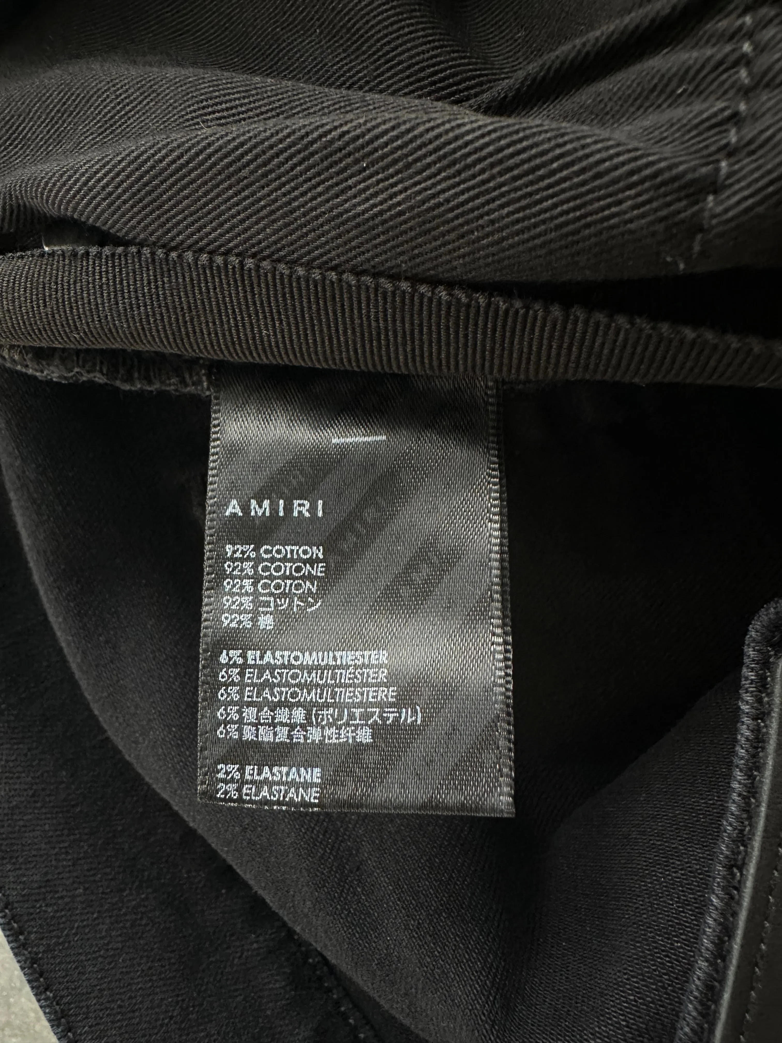 Amiri Aged Black & Red Patch MX1 Jeans