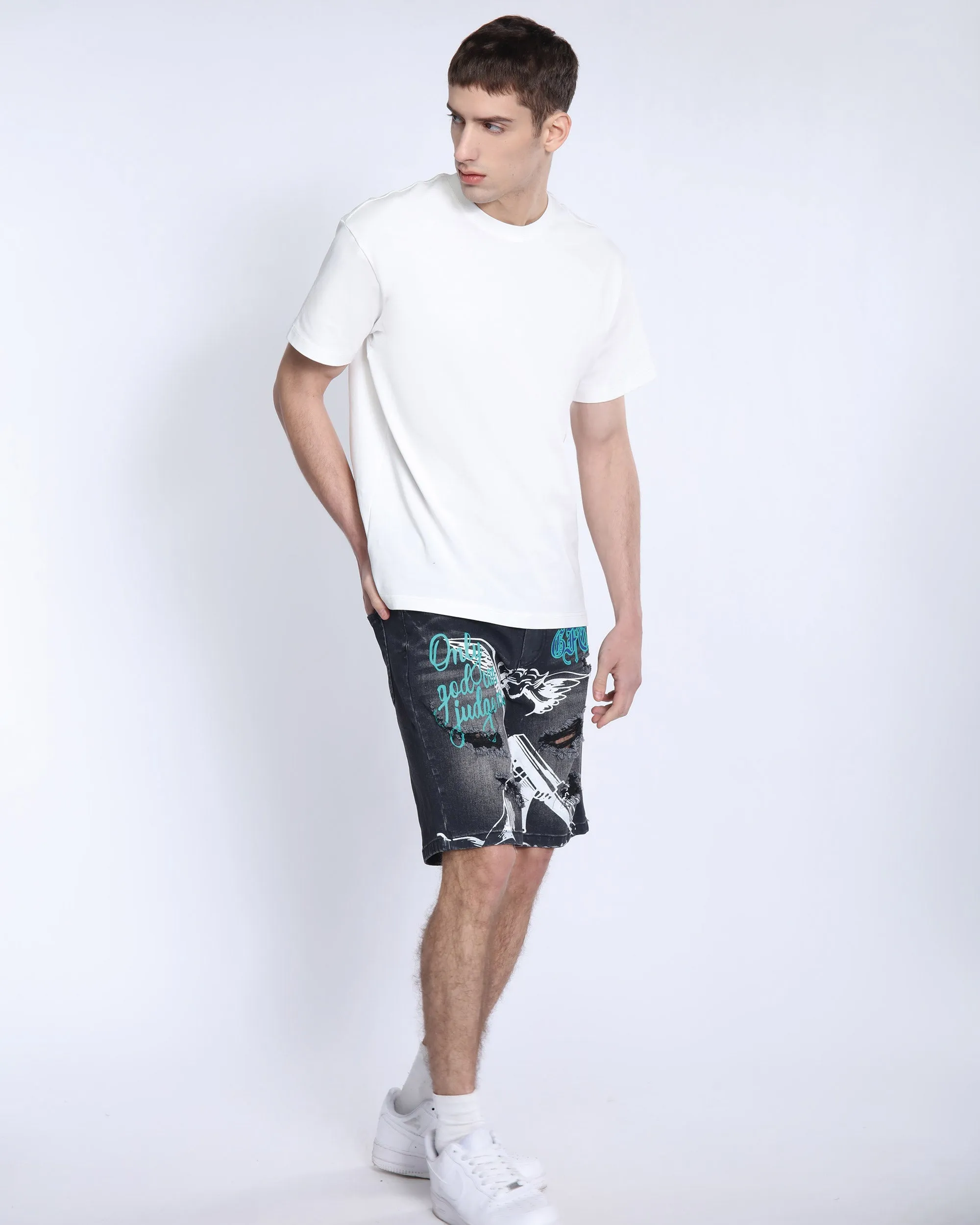 Black Ripped Denim Shorts: Street Art Vibes